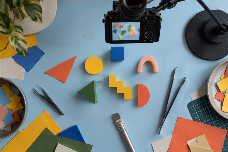 Camera above geometric paper shapes for stop-motion content